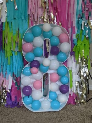 Making a fringe backdrop as easy as 1-2-3. Check out our tutorial on a DIY fringe party backdrop that your guests will love.